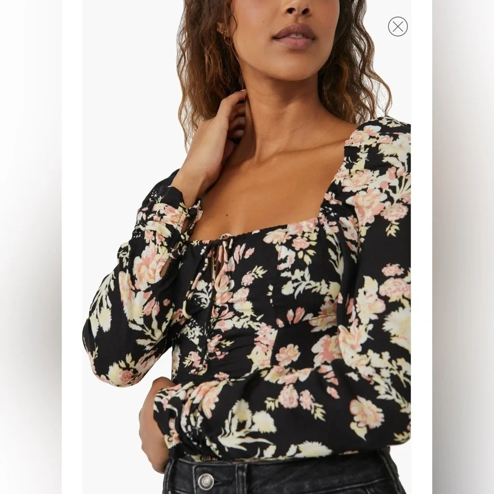 NWT. $98R. Free People Hilary Top. Size M. Black Combo